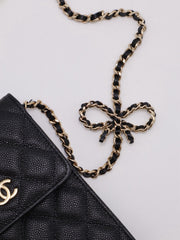 CHANEL Bow Ribbon Leather-Interwoven Chain Phone Holder - Black with Gold Hardware