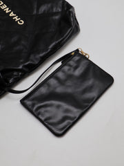 CHANEL 22 Handbag Medium - Black/White Logo with Gold Hardware