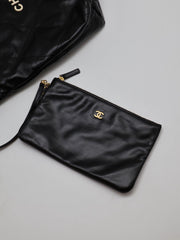 CHANEL 22 Handbag Medium - Black/White Logo with Gold Hardware