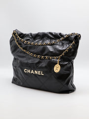 CHANEL 22 Handbag Medium - Black/White Logo with Gold Hardware